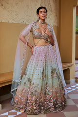 Raga Bridal Lehenga Set by Moledro with a shimmer net skirt featuring palm tree motifs and a net blouse, Luxury designer wear for weddings in Dubai, UAE.