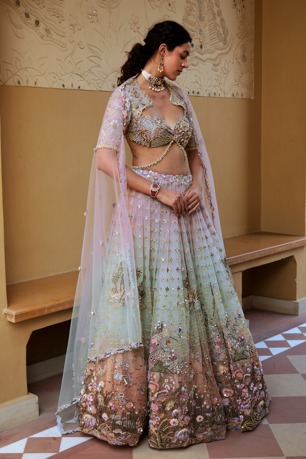 Luxurious three-piece bridal lehenga set designed by Moledro for weddings and festive events.