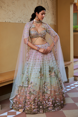 Lightweight butterfly net dupatta with aqua and lilac hues, complementing the bridal outfit.