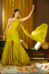 Draped sharara is highlighted with gold foil print