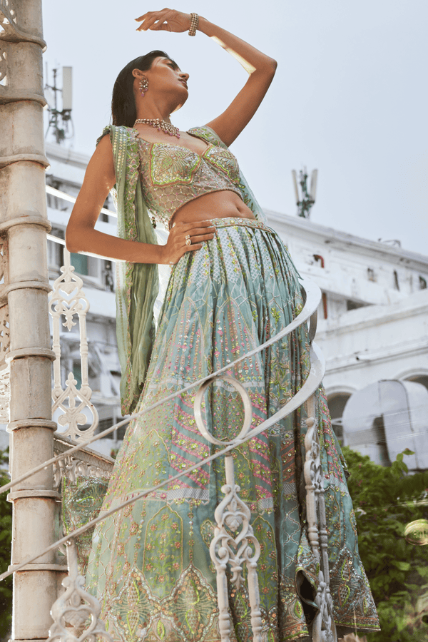 Turquoise Party Wear Sequins Embroidered Silk Lehenga